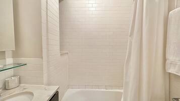 Hair dryer, towels, soap, shampoo