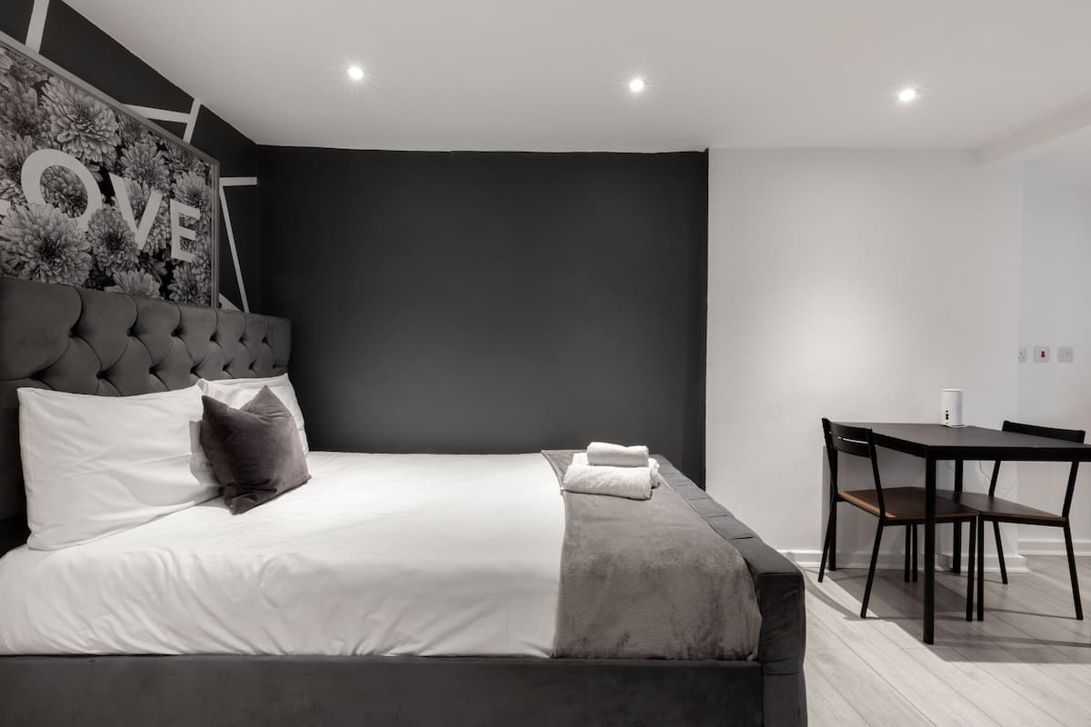 2 bedrooms, desk, laptop workspace, iron/ironing board