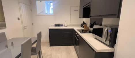 Apartment | Private kitchen | Fridge, microwave, oven, stovetop