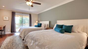 3 habitaciones, escritorio y tabla de planchar con plancha