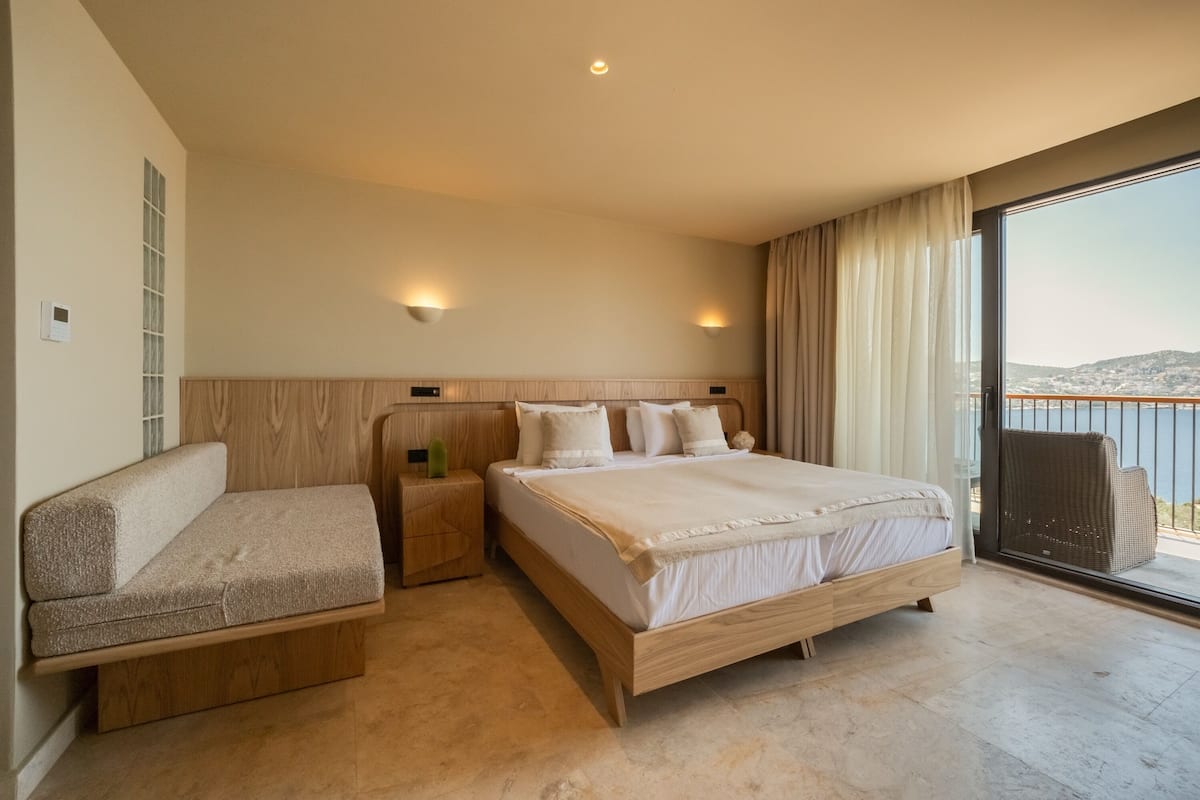 Standard Double Room, Balcony, Sea View | Minibar (some free items), in-room safe, desk, WiFi (free)