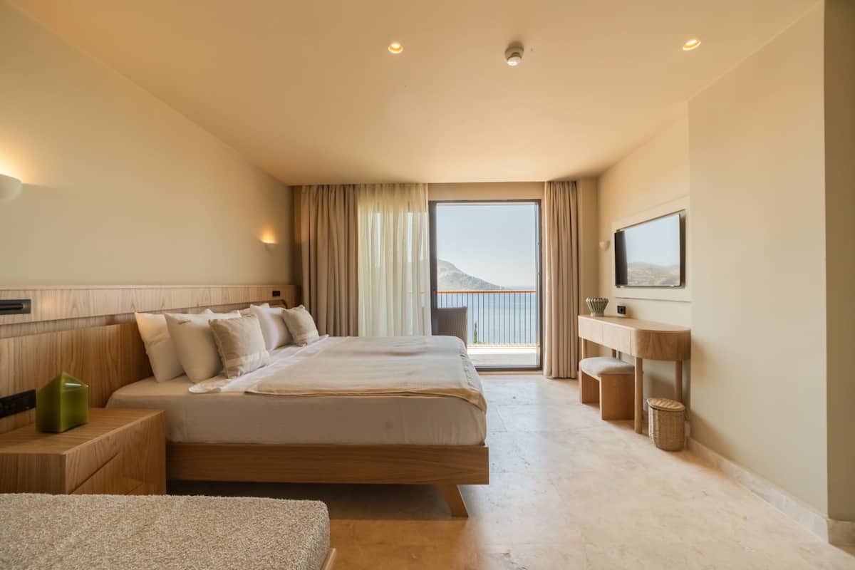 Standard Double Room, Balcony, Sea View | Minibar (some free items), in-room safe, WiFi (free)