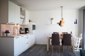 Fridge, microwave, dishwasher, coffee/tea maker