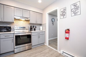 Fridge, microwave, oven, stovetop - Stylish 2BR, Unit 2, Smart Lock, Yard, Laundry (East Orange)