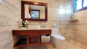 Shower, hair dryer, towels, soap