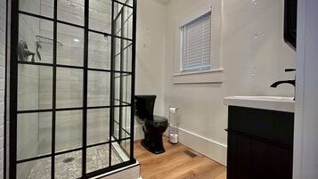 Shower, towels, soap, toilet paper