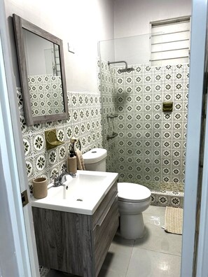 Shower, hair dryer, towels, soap