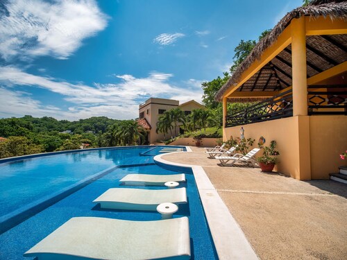 Relax in this spacious home in a quiet community with shared pool and BBQ area
