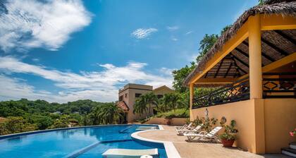 Relax in this spacious home in a quiet community with shared pool and BBQ area