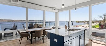 Top floor end unit with covered porch overlooking Lake Pepin - Assigned Garage - Unit 305