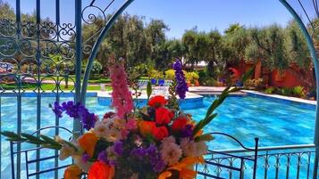 Outdoor pool, open 9:00 AM to 9:00 PM, free pool cabanas, pool loungers