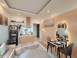 Hypo-allergenic bedding, desk, laptop workspace, blackout curtains