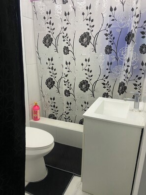 Hair dryer, towels, soap, shampoo