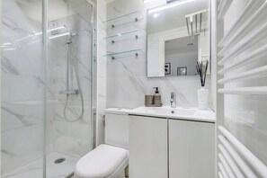 Shower, free toiletries, hair dryer, towels