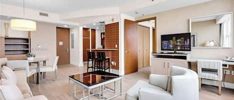 Luxury Apartment, City View | Living area | Flat-screen TV