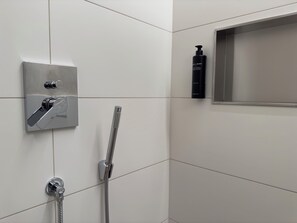 Hair dryer, bidet, towels, soap