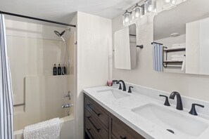Hair dryer, bidet, towels, soap