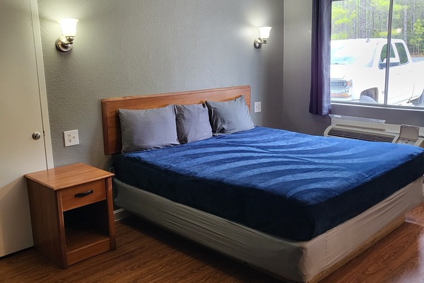 Economy Room, 2 Queen Beds, Balcony, Garden View | 1 bedroom
