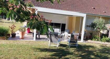 Semi-detached house in the countryside garden covered terrace