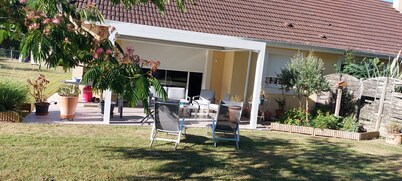 Semi-detached house in the countryside garden covered terrace
