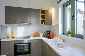 Réfrigérateur, four, plaque de cuisson, lave-vaisselle