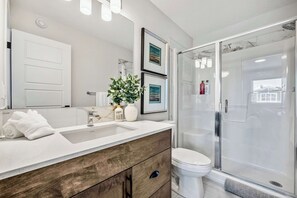 Shower, hair dryer, towels