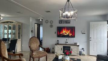 Smart TV, fireplace, ping pong, books