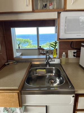 Fridge, microwave, stovetop, coffee/tea maker