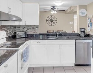 Fridge, microwave, oven, stovetop - Comfy,Cozy,1st-FL condo close to beautiful beaches,fine dining, and attractions. (Naples)