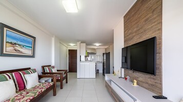 Apartamento | Sala de estar | TV LED, mesa de pingue-pongue, videoteca