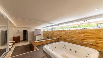 Relax in the hot tub with multiple jets, or unwind on the bench amidst the soothing ambiance.