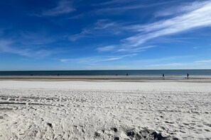 On the beach, sun loungers