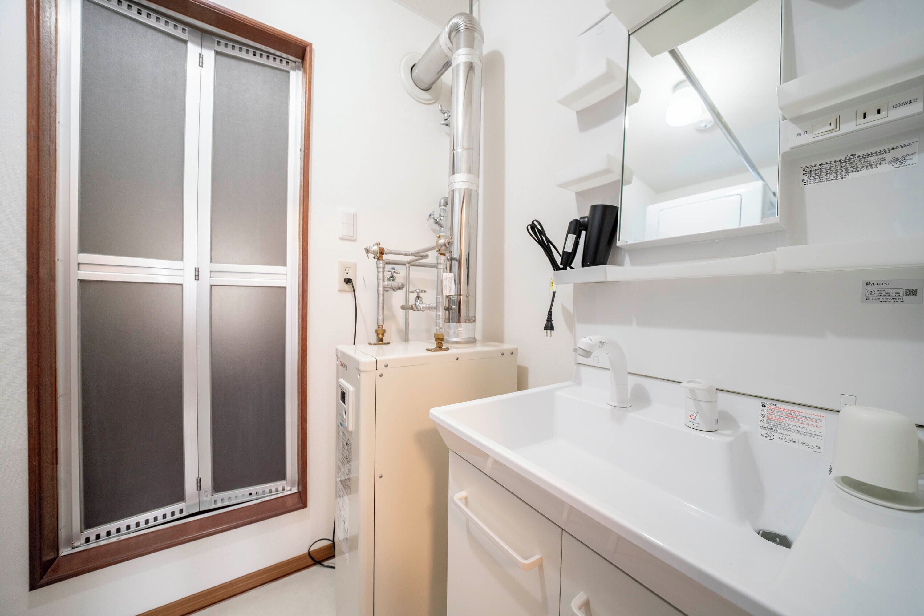 Separate tub and shower, free toiletries, hair dryer, slippers