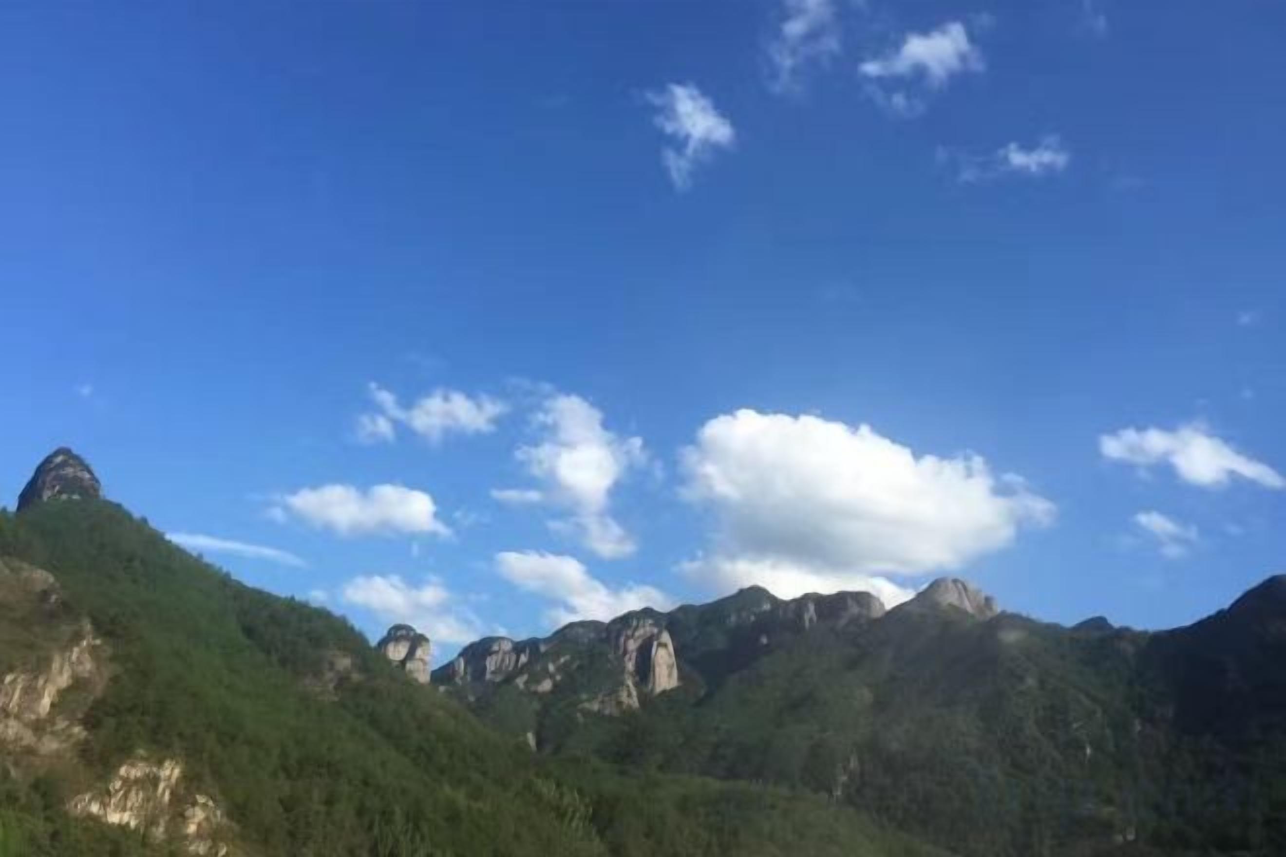 A mountainous landscape with clear skies.