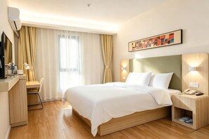 A hotel room with a bed, bedside table, desk, chair, and a large window with curtains. - Hanting Hotel (Wuxi Qianzhou Wuzhou International Plaza) (Wuxi)
