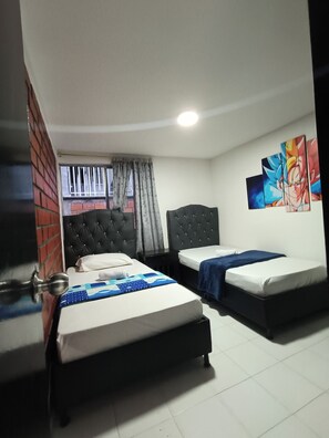 4 dormitorios, escritorio, tabla de planchar con plancha y wifi gratis