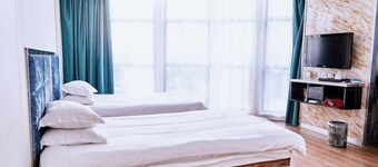 Linhai Tailong Business Hotel (Duqiao Babylong Plaza)