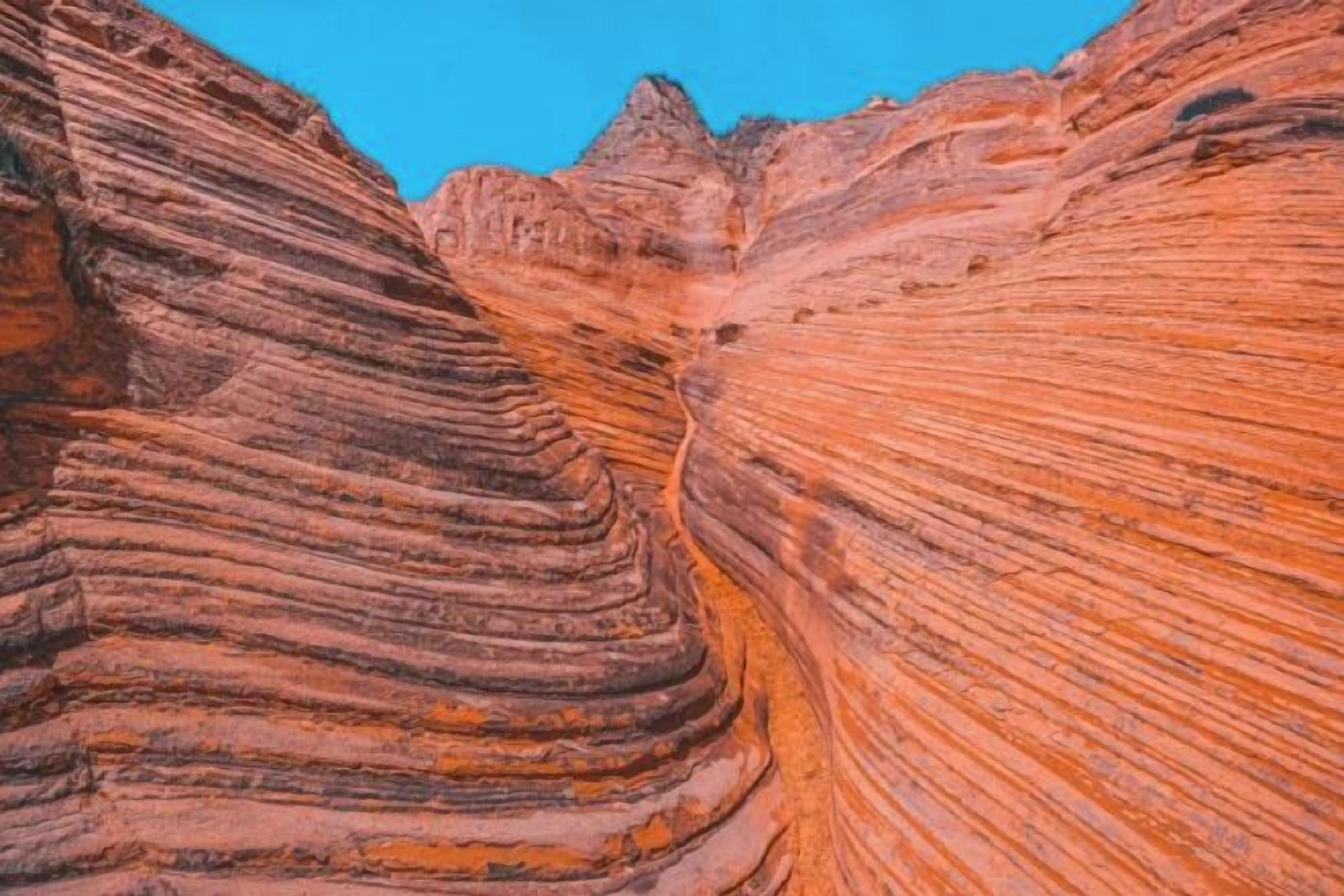A canyon with layered rock formations.