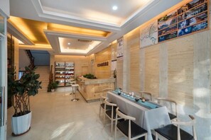Unclassified image, 5 of 22, button - Xinxing Business Hotel (Wuyishan)