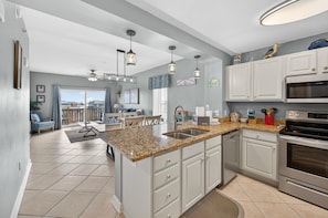 Condo | Private kitchen | Full-size fridge, microwave, oven, stovetop