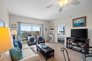 Condo | Living area | 42-inch Smart TV with cable channels - Waterside Village by Panhandle Getaways (Port St. Joe)