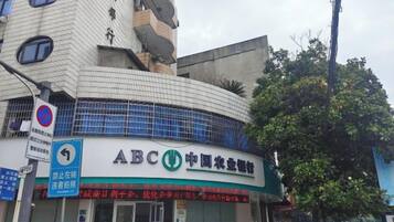 A building with a sign for ABC China Agricultural Bank.