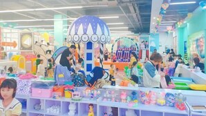 A busy indoor play area with various toys and activities. - Hanting Hotel (Linchuan No. 2 Middle School) (Fuzhou)