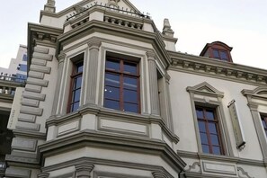 A corner building with a bay window and a dormer window. - Residential quarters in Yinqi mountain, Qingdao (Qingdao)