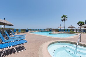 A heated pool - Beachfront Luxury with Resort Pools, Hot Tubs, Tennis Courts & More! (South Padre Island)