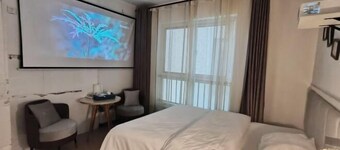 Guomao Holiday Apartment Hotel