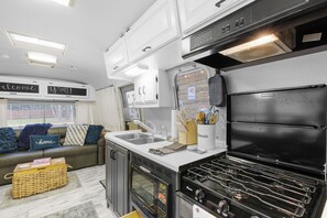 Fridge, microwave, stovetop, coffee/tea maker