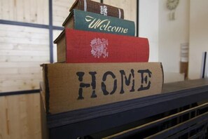 A stack of boxes with the words 'Welcome' and 'HOME' on them. - Angel Inn (Hualien)
