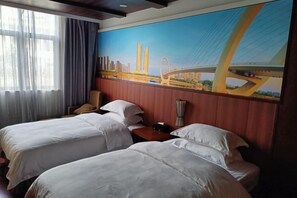 A hotel room with two beds, a large window with curtains, and a mural of a bridge. - Guli Hotel (Nanjing)