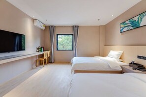 A modern hotel room with a large bed, a TV, a desk, and a window with curtains. - Allston Light Hotel (Xiamen Gaoqi Airport & Wuyuan Bay) (Xiamen)